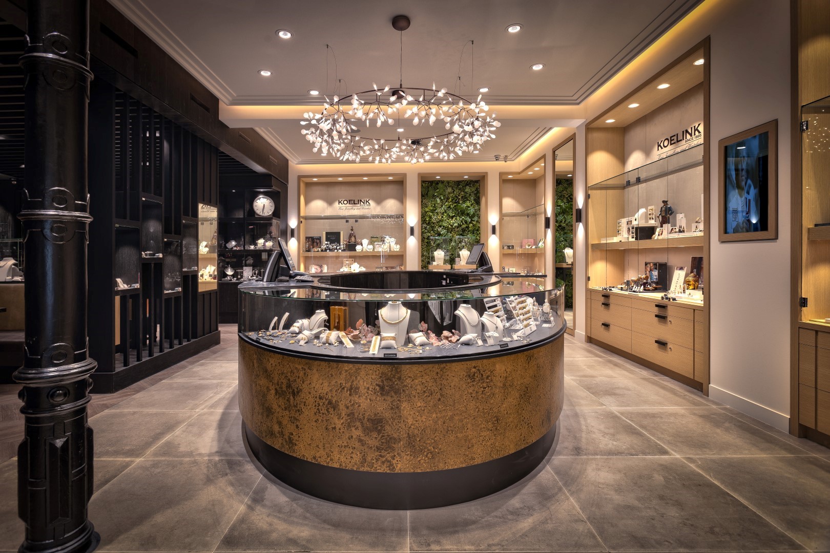 Luxury shop fitting of jeweler with central sales counter WSB Shopfitting