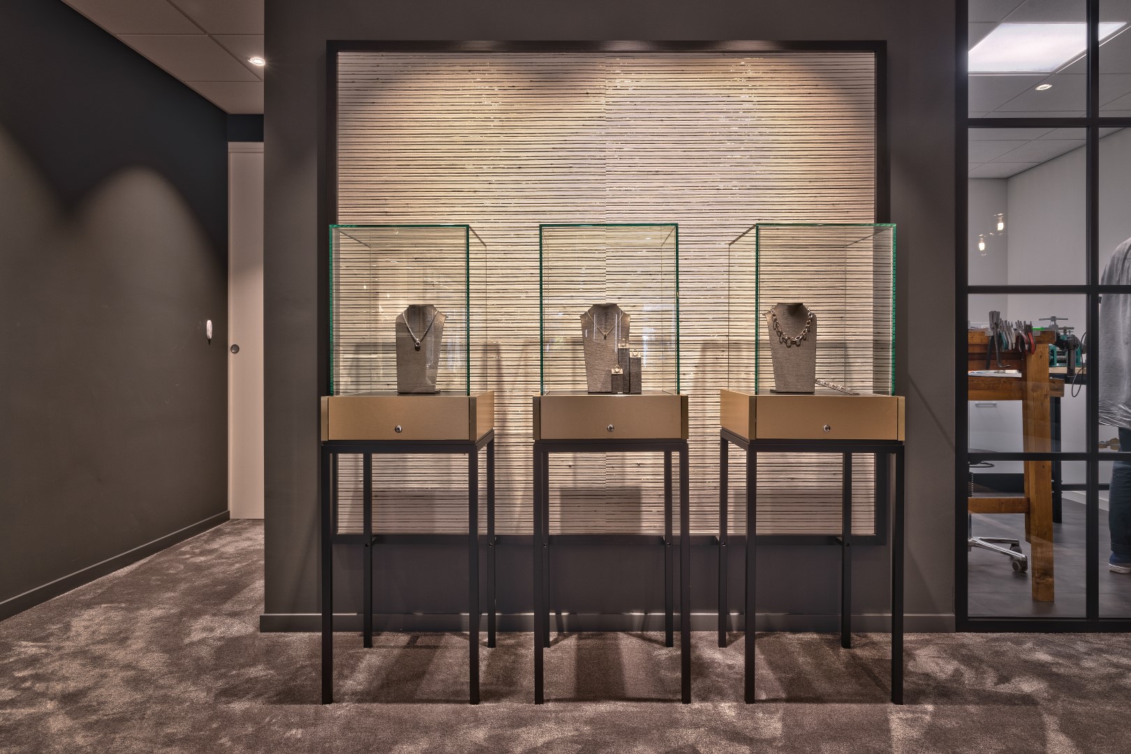 Free-standing display cases for jewelry from shop furniture for Zuyver Jewelers.
