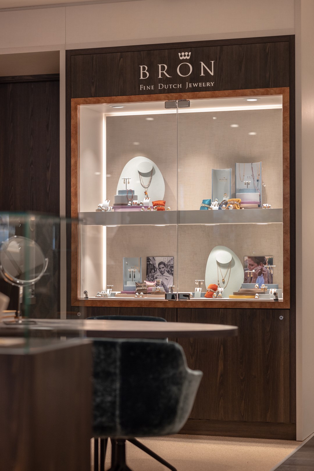Personalized Bron Display Case for your jewelry store with lighting and glass doors.